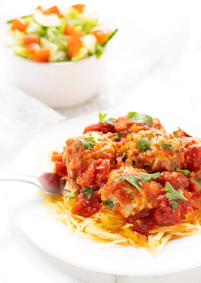 Plate of Chicken Quinoa Meatballs on spaghetti squash