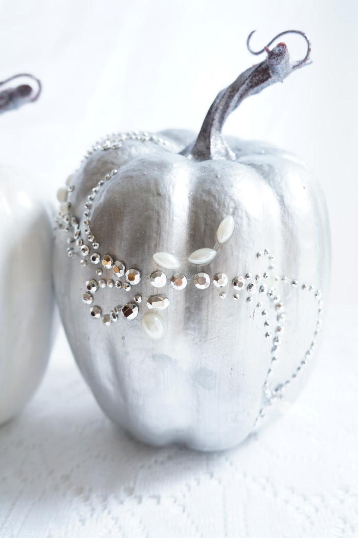 Shiny, silvery pumpkin with shiny and pearl embellishments