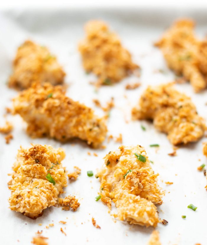 Sheet pan of cooked Almond Coconut Crusted Fish Sticks