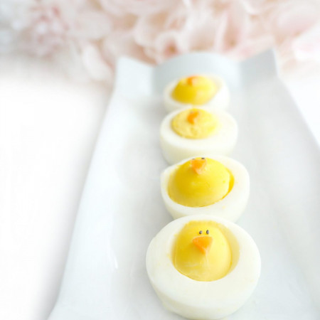 Line of hard-boiled eggs in the shape of baby chicks