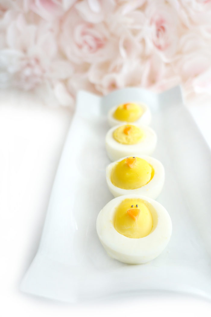 Line of hard-boiled eggs in the shape of baby chicks
