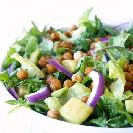 Closeup of Vegan Caesar Salad with Roasted Sriracha Chickpeas