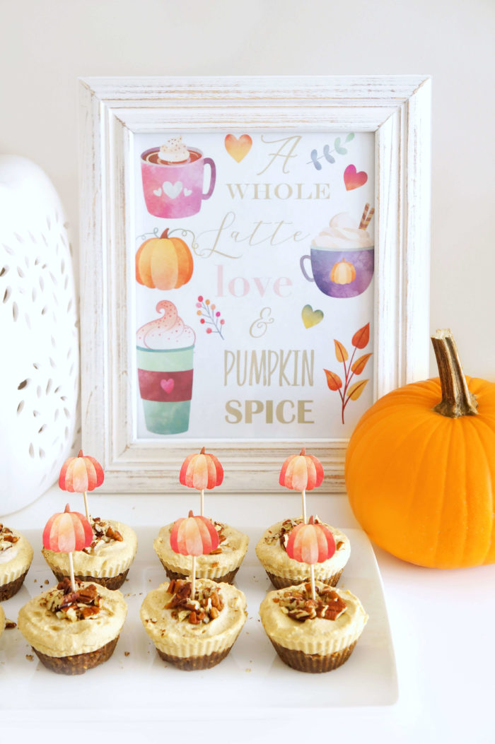 Framed paper decorated with pictures of drinks and the text \"A whole latte love & pumpkin spice\"