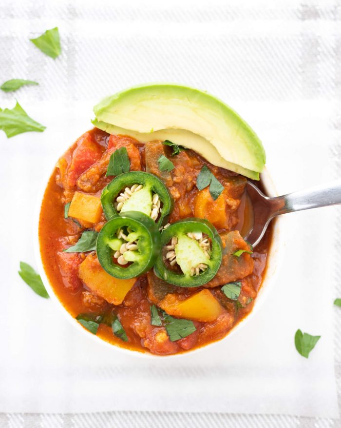 Bowl of Whole30 Pumpkin Chili with jalapenos and avocado