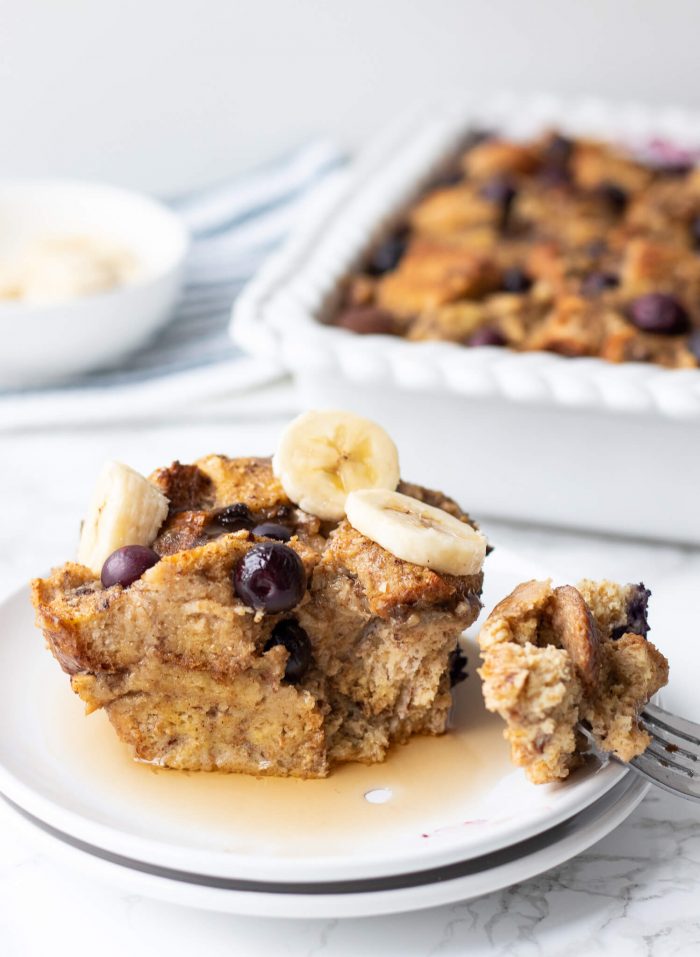 Blueberry Banana Baked French Toast Casserole topped with bananas