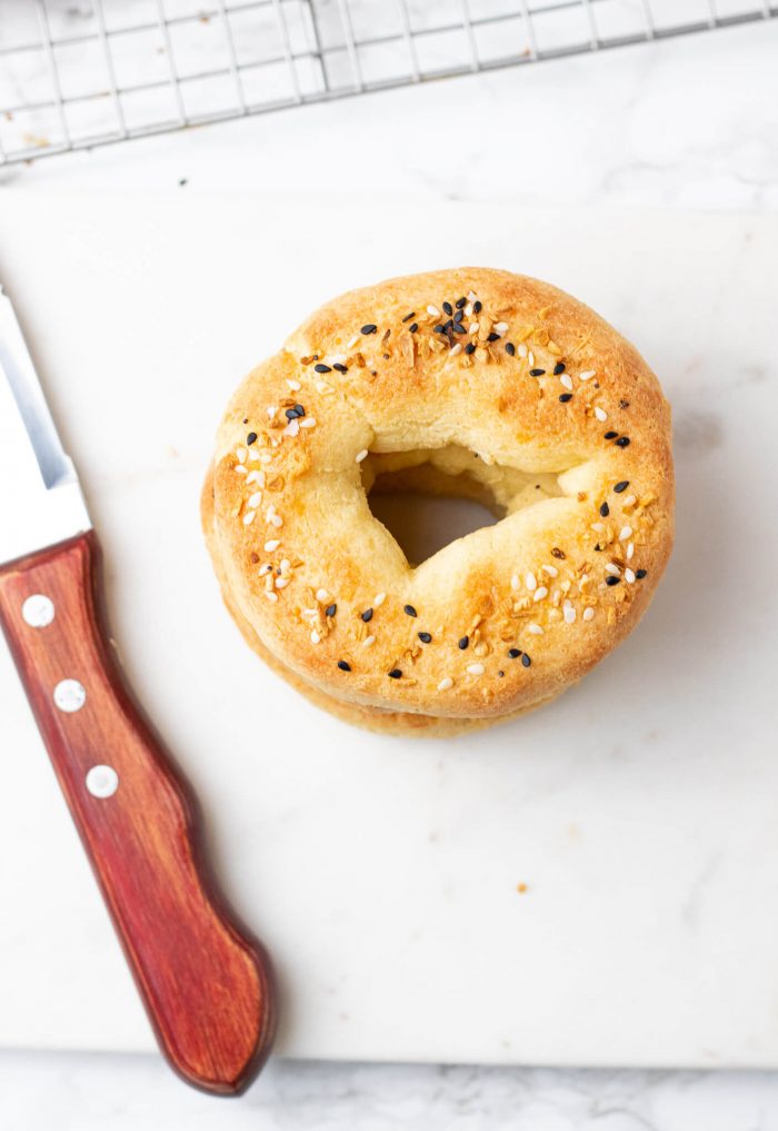 Overheard shot of Low Carb Bagels and a knife