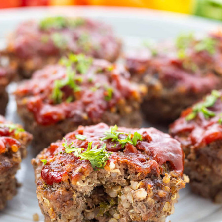 Mini meatloaf muffins on a white plate