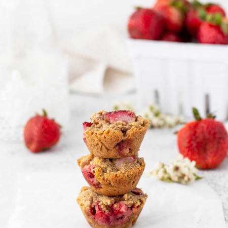 stack of mini muffins with strawberries