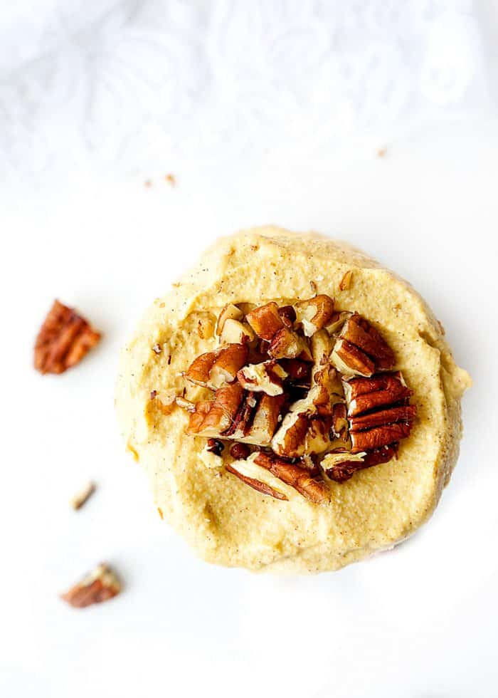 top shot of no bake pumpkin cheesecake with pecans on top