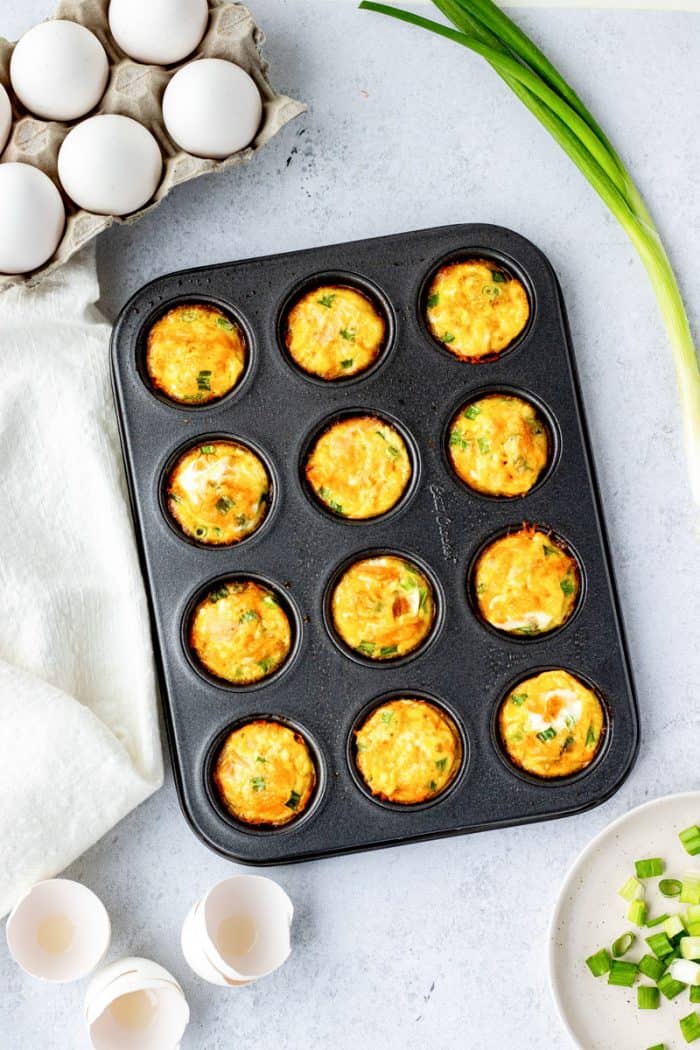 Baked egg muffins in a tin ready to serve.