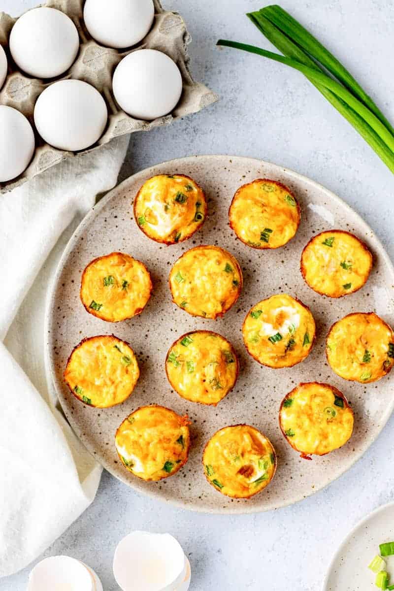 Egg cups on a plate ready to serve.