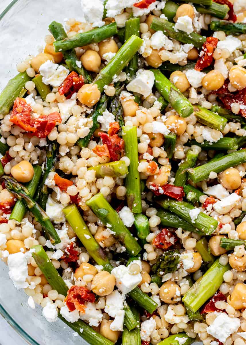 up close shot of pearl couscous salad with roasted asparagus and chickpeas