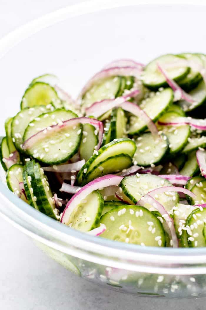 Close up of the Asian cucumber salad in a bowl.