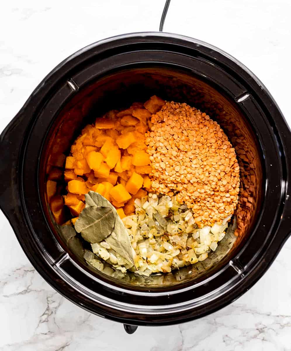 Ingredients for healthy mac and cheese in a slow cooker.