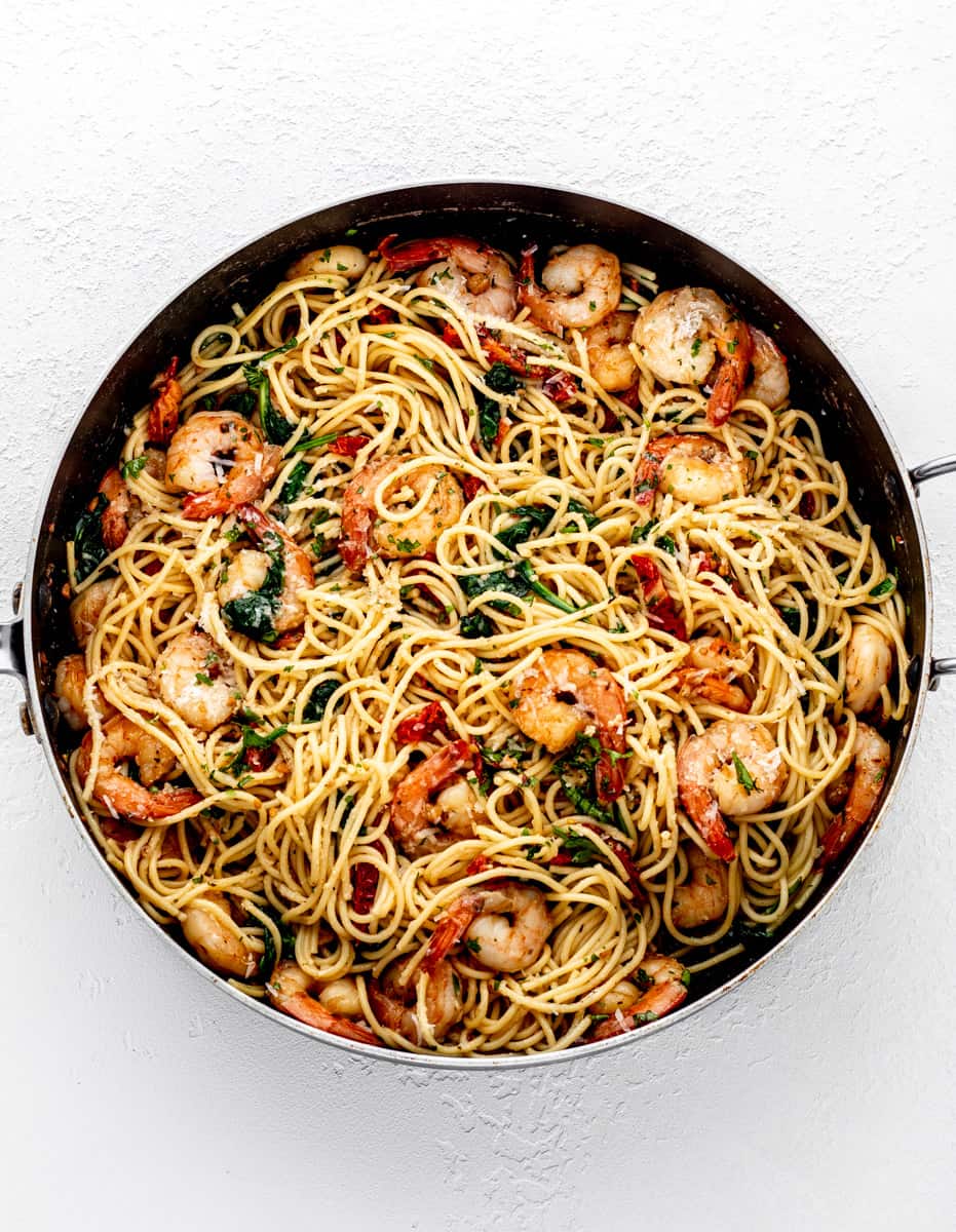 Lemon garlic spaghetti tossed with the cooked shrimp, spinach and sun-dried tomatoes.