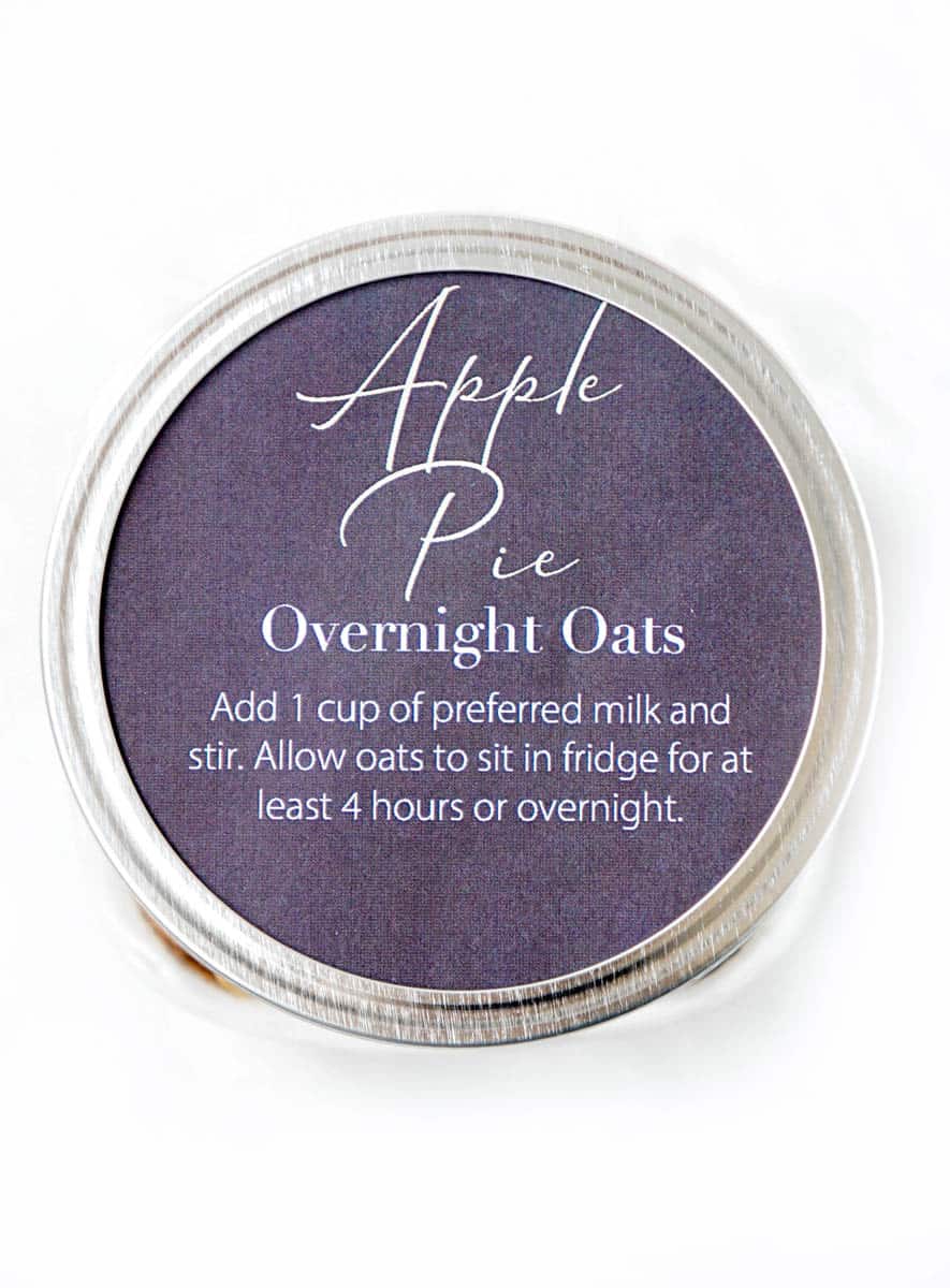 Overhead shot of chalkboard label that says "apple pie overnight oats."