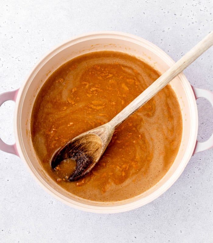Coconut oil, peanut butter and honey melted together in a pot.