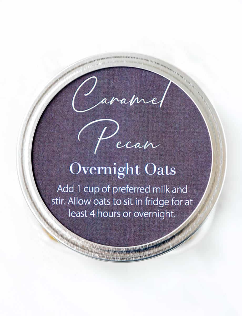 Overhead shot of chalkboard label that says "caramel pecan overnight oats."