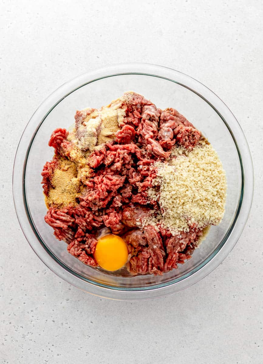 Burger ingredients in a bowl.