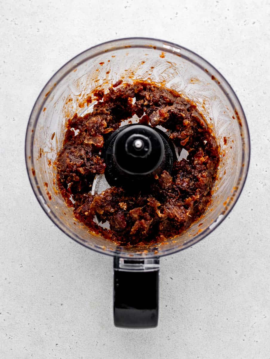 Dates and water in a food processor.