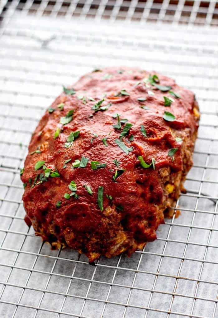 Finished one pound meatloaf garnished with parsley.