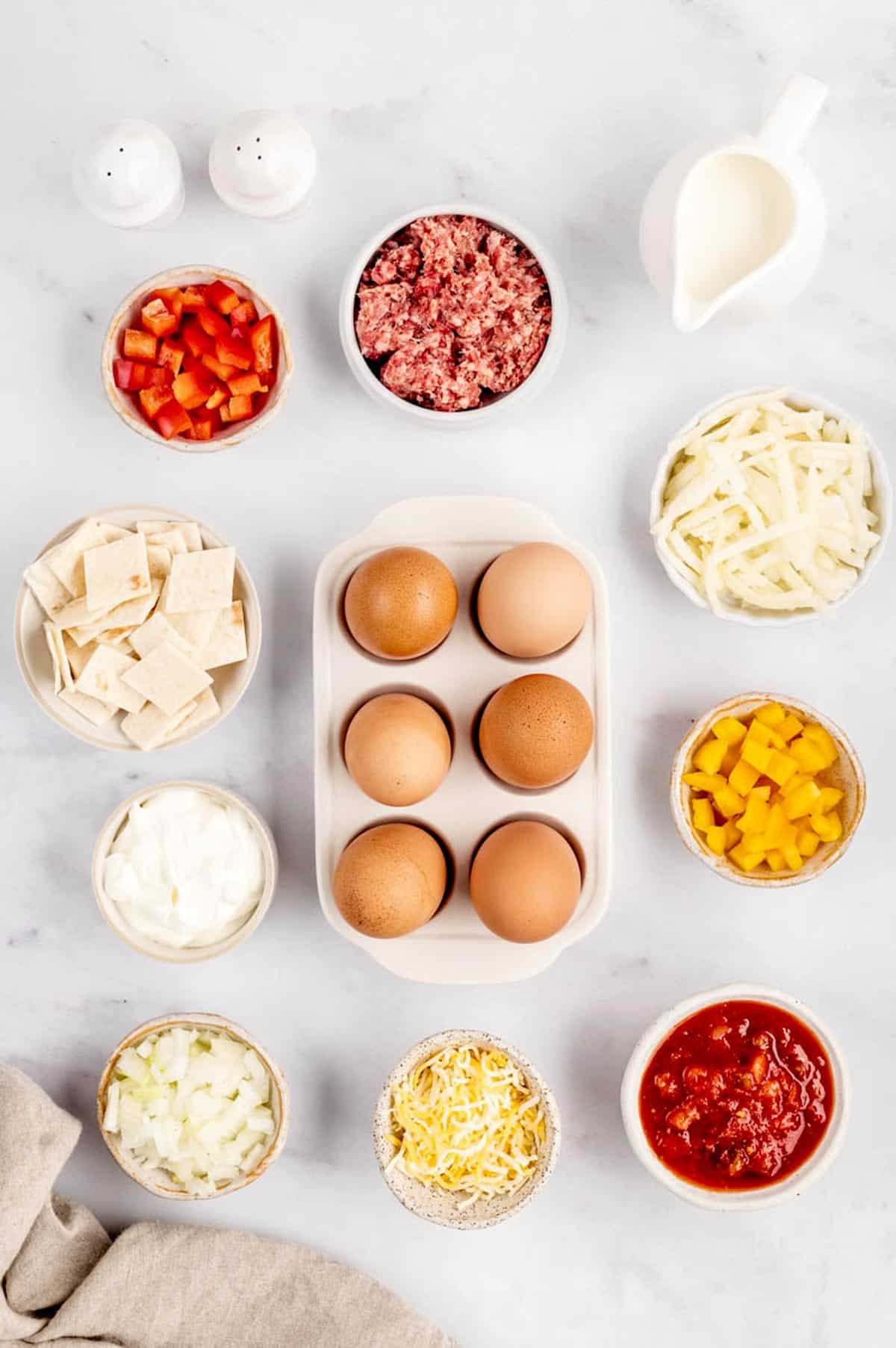 Ingredients required to make the breakfast burrito casserole recipe.