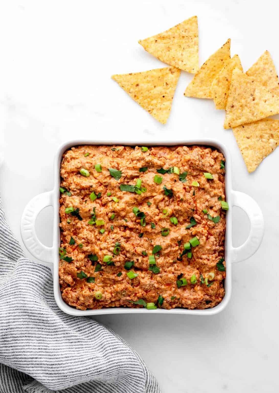 Easy Taco Dip Recipe with Ground Beef - Haute & Healthy Living