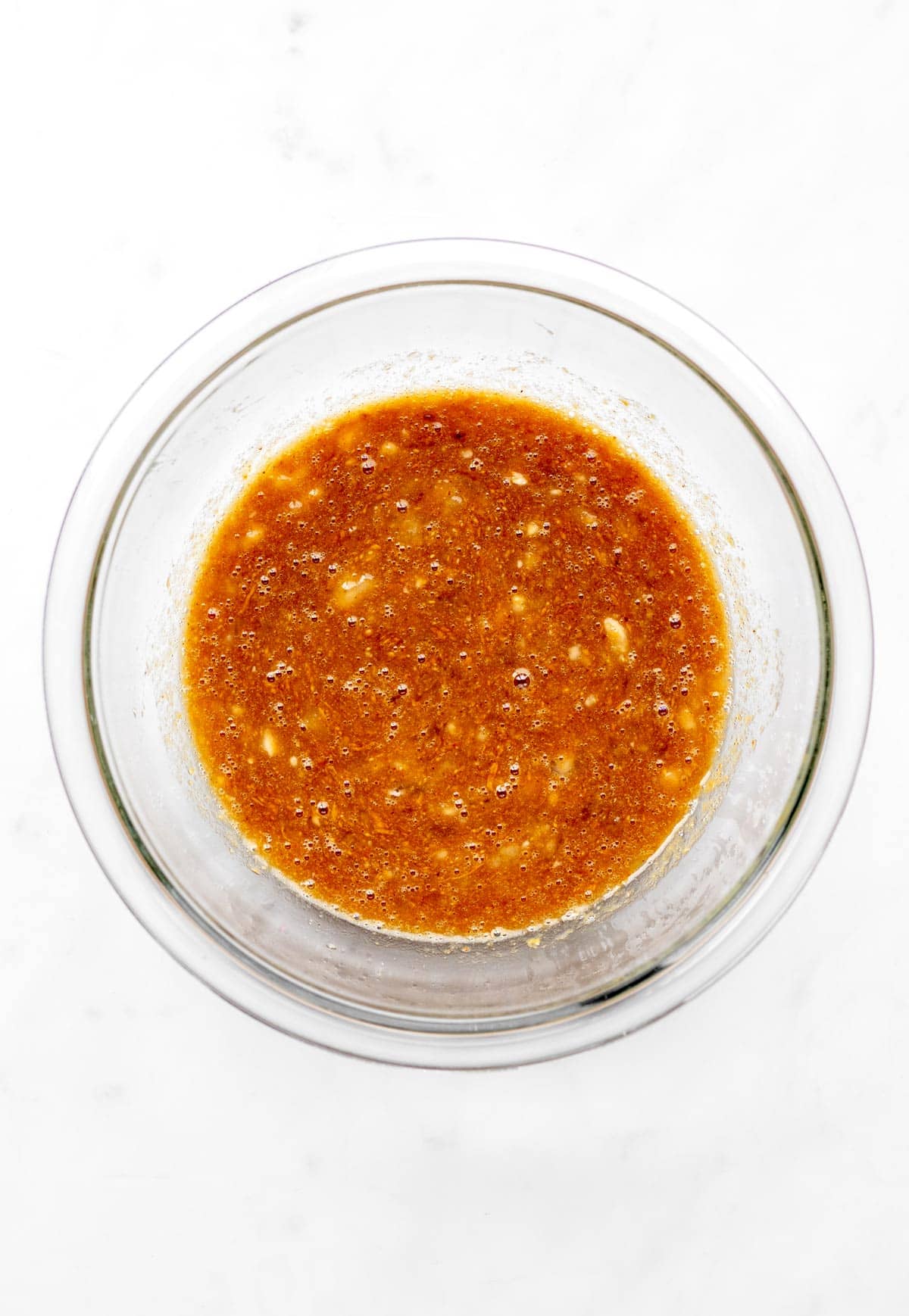 Wet ingredients for the cookies mixed together in a bowl.