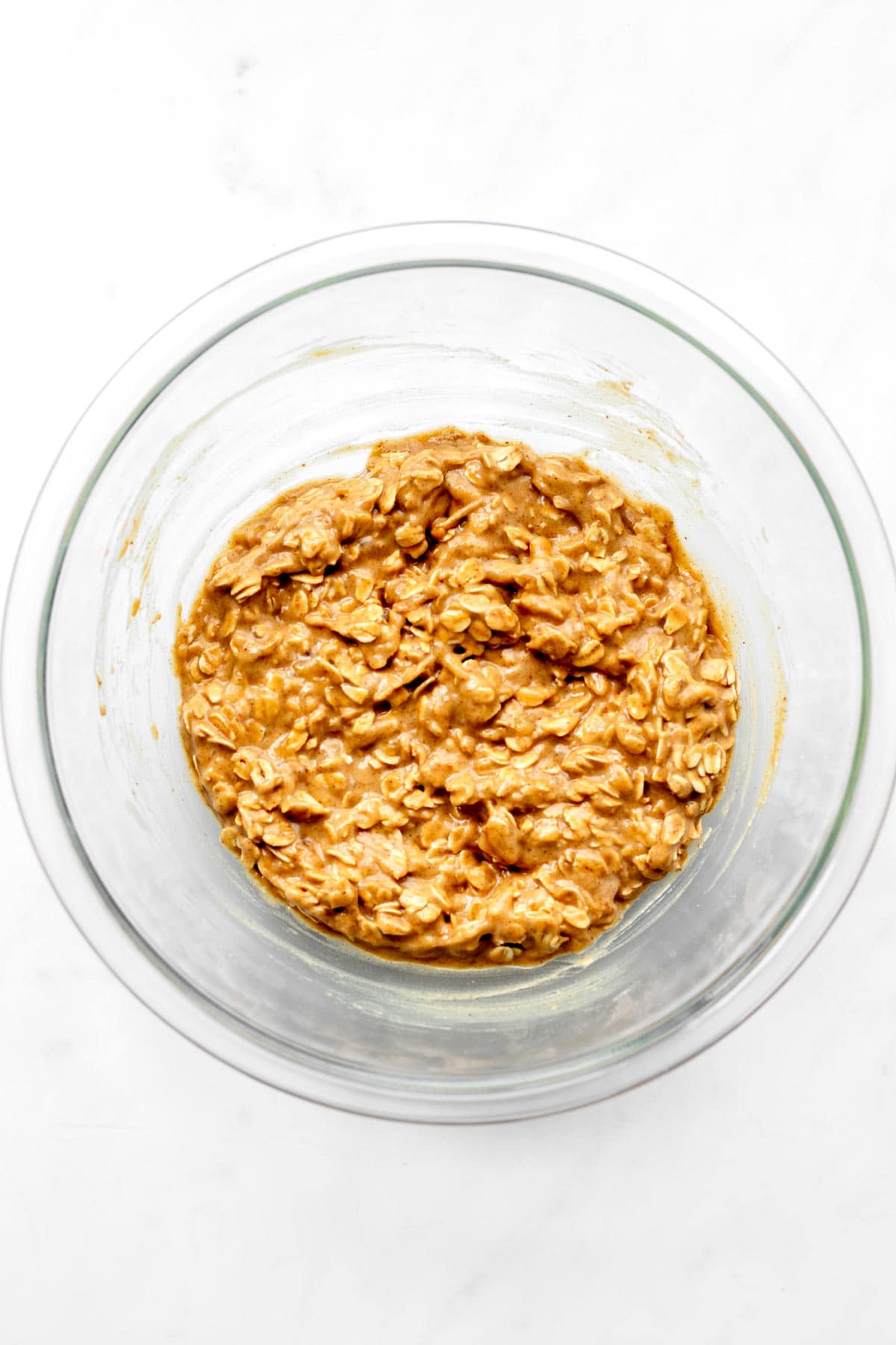 Dry ingredients and wet ingredients for the cookies combined together in a bowl.