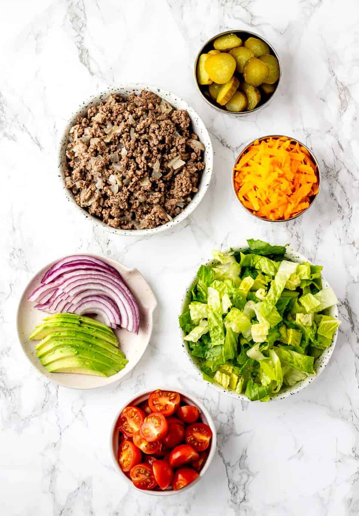 Ingredients to make the burger salad bowl recipe.