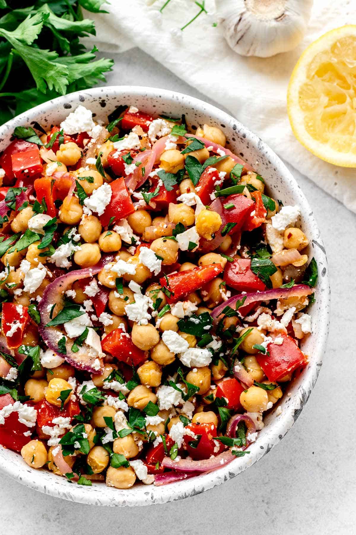 Bird's eye view of Mediterranean chickpea salad in a bowl.