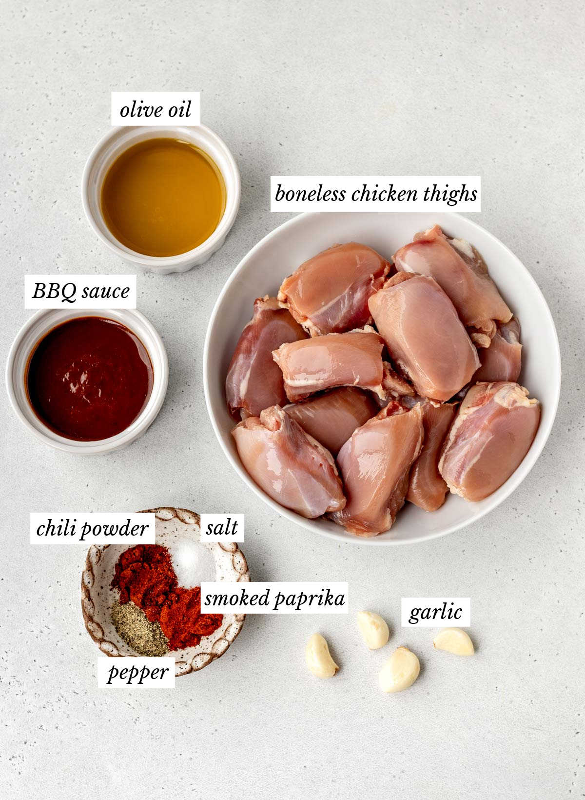 Labeled ingredients for the grilled bbq boneless chicken thighs recipe.